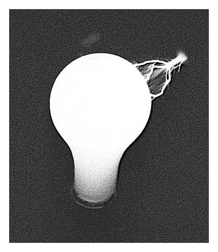Electricity striking a light bulb